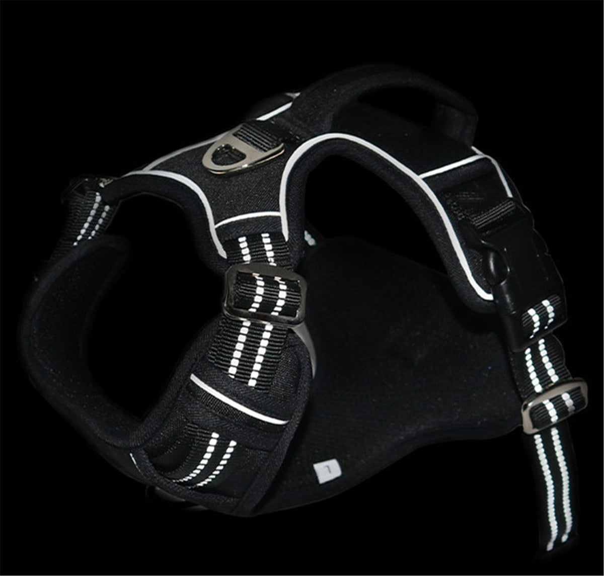 Arnés impermeable y resistente para perros con asa vertical.